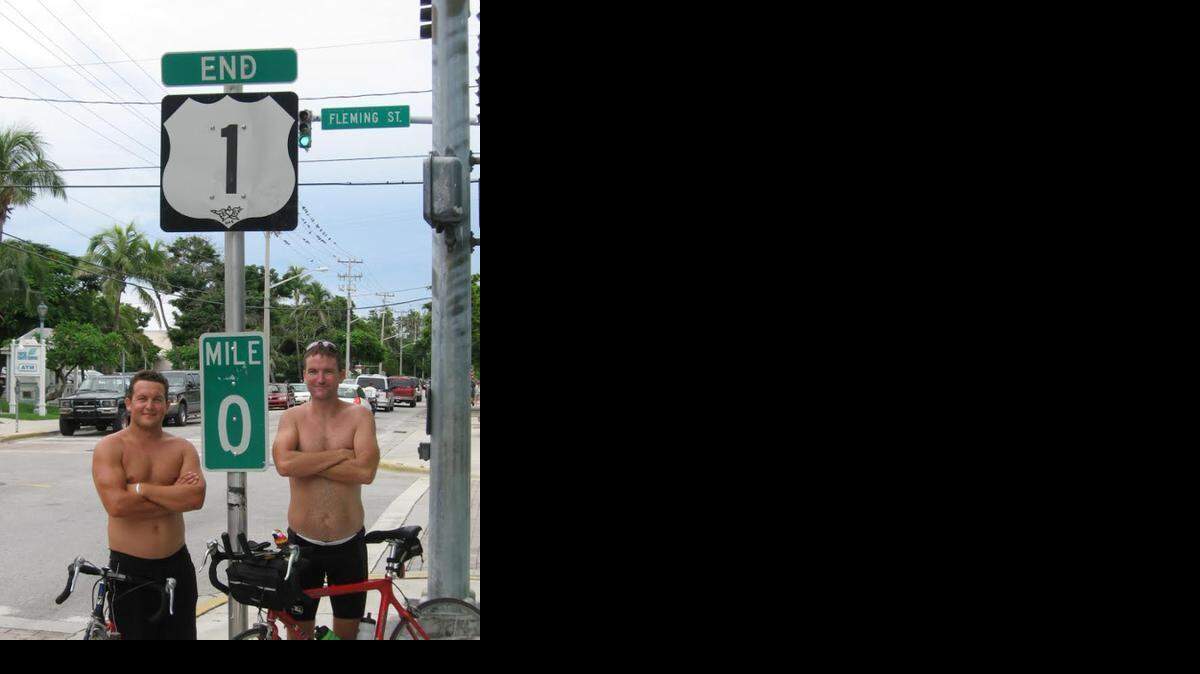 
End of the road: Chris Nelson, left, and Brian Callanan, after finishing their 40-day bicycle ride from Calais, Maine, to Key West, on Labor Day weekend, 2006. Biking strengthens Callanan’s lungs; he has Cystic Fibrosis. 


