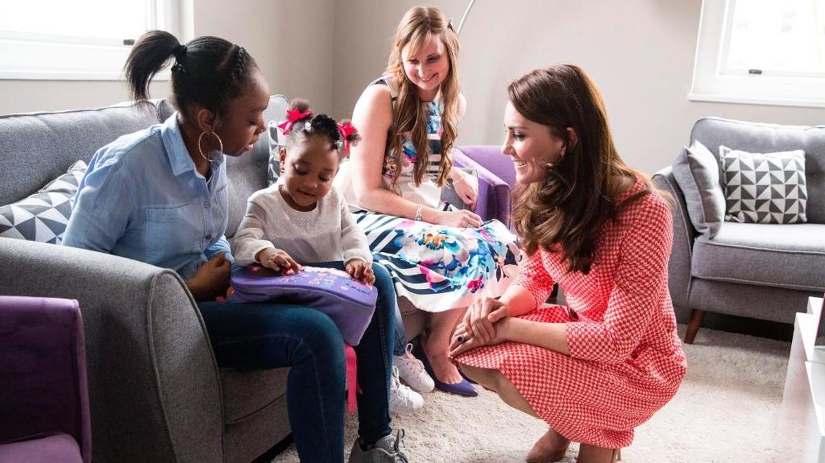 Britain's Catherine, Duchess of Cambridge (R), meets Kirsty Francois (L) and her 2 year-old daughter Teegan-Mia, during a meeting with a parent support group while attending the launch of a series of films to raise awareness of maternal mental health challenges in London on March 23, 2017. Best Beginnings, a charity partner of the Heads Together campaign which is led by The Duke and Duchess of Cambridge and Prince Harry, has launched the 'Out of the Blue' film series to explore a range of mental health conditions.