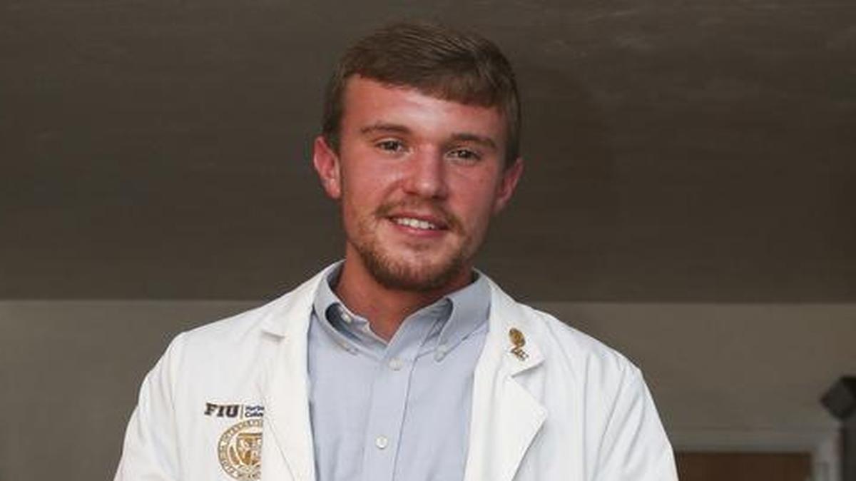 Andrew Miller, an FIU medical school student, meets with Sarah Braxton regularly to help her stay healthy. Miller works with the university's NeighborhoodHELP program, which aims to teach students how they should address the health and socioeconomic needs of low-income communities.