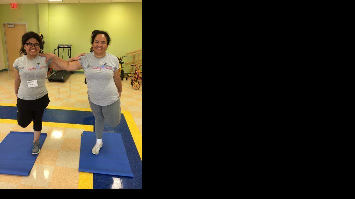 
Kimberly Arzu, 17, completed the Healthy Chicas wellness program with her mom, at Miami Children's Hospital. During the 10-week program, moms and their teenage daughters learn about different type of physical activity and healthy eating. 
