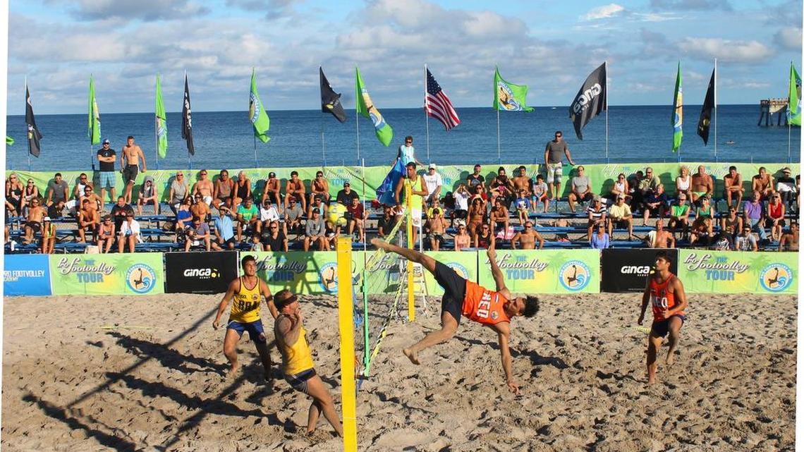 Holland’s Fernando Plentz, in orange, performs a “Shark Attack” against Brazil in the 2015 Deerfield Beach Final.