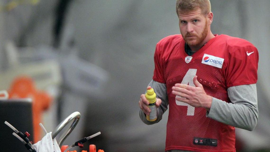 Miam Dolphins punter Matt Darr puts on sunscreen prior to outdoor practice on Sept. 1, 2015, in Davie.