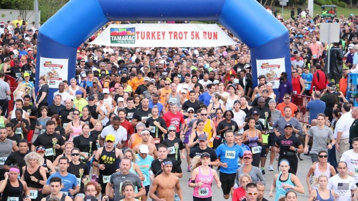 Runners line up at the start of the Tamarac Turkey Trot. The 37th annual race is Thursday, Thanksgiving Day.