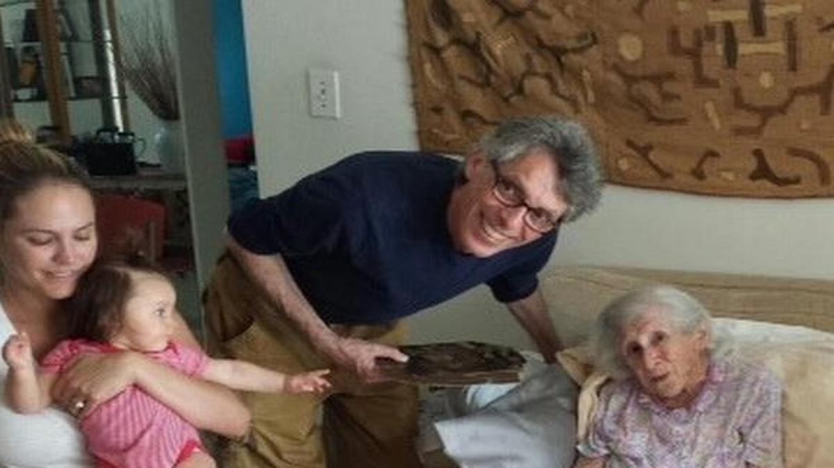 In the living room of Allan Richards’ home: his daughter Cheyne, holding her daughter Madison, Richards, his mother, Anne Ziselman, and his son-in-law Ryan. Photo taken in February 2014; Anne died in October 2014.