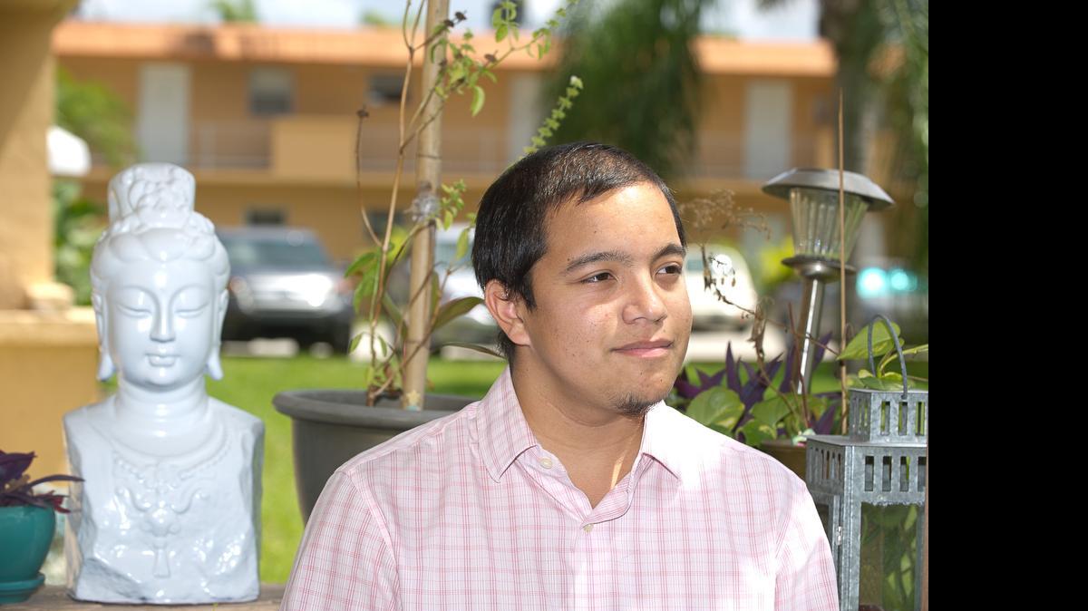 
Ongoing battle: As a brain cancer patient, Victor Ramirez, 20, of Kendall had to relearn how to walk and went through speech therapy classes as his voice changed after surgery. Ramirez still lives with the side effects of his treatment.
