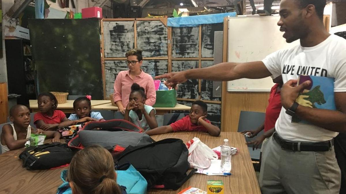 2016 Youth Institute fellows, Rachel Mazyck and Jerry Paret, used books to teach children at The Barnyard Coconut Grove Cares about peace, kindness and how to use their hands to help rather than hurt. The service learning project was created entirely by a group of Youth Institute students with the goal of eliminating gun violence. About 100 children received free books after the presentation.