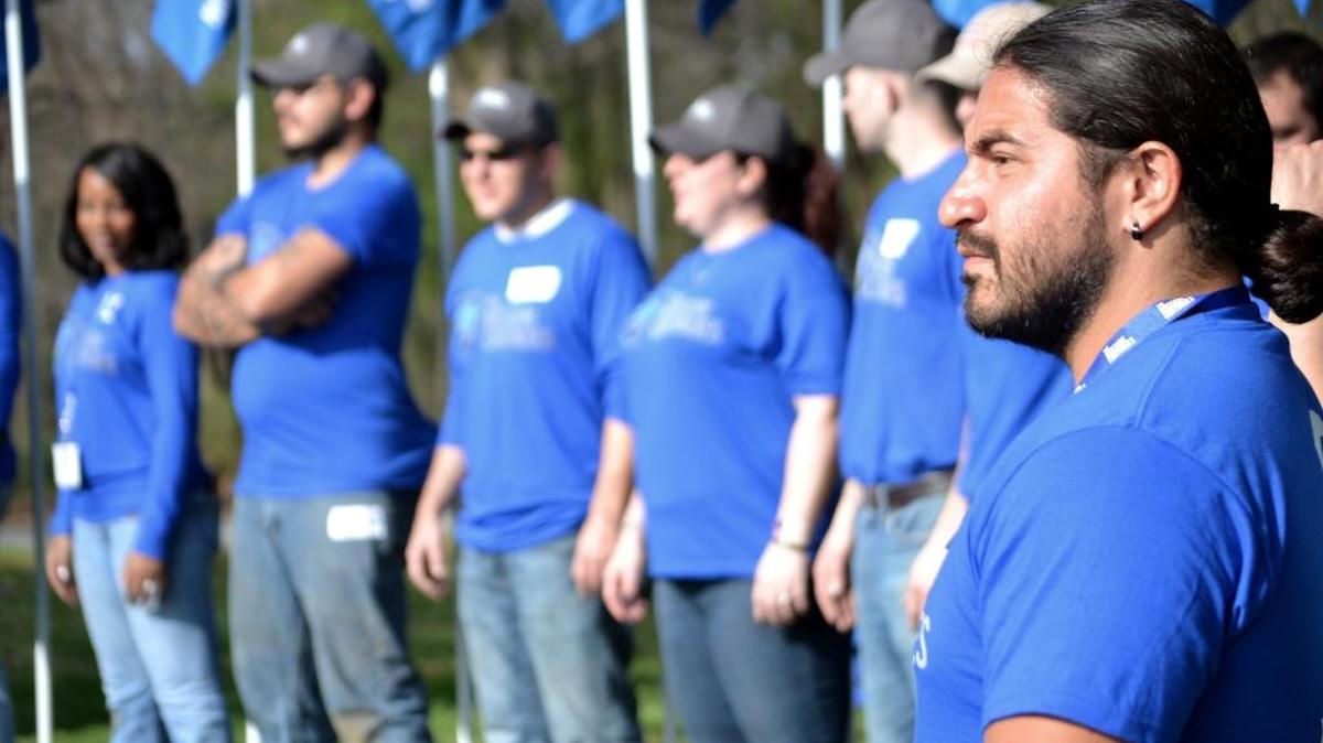 Edwin S. Vasco Gonzalez, first Miami service platoon leader for Mission Continues, listens to a speech at an event earlier this year.