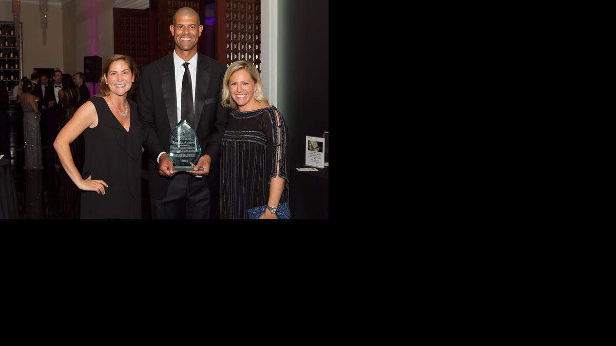 
Newell Fleming, the Executive Director of the Battier Take Charge Foundation poses with Shane and Heidi Battier. Battier won the Coral Gables Community Foundation’s Sports Award, sponsored by Doctor’s Hospital Center for Orthopedics & Sports Medicine, at the foundation’s annual gala.
