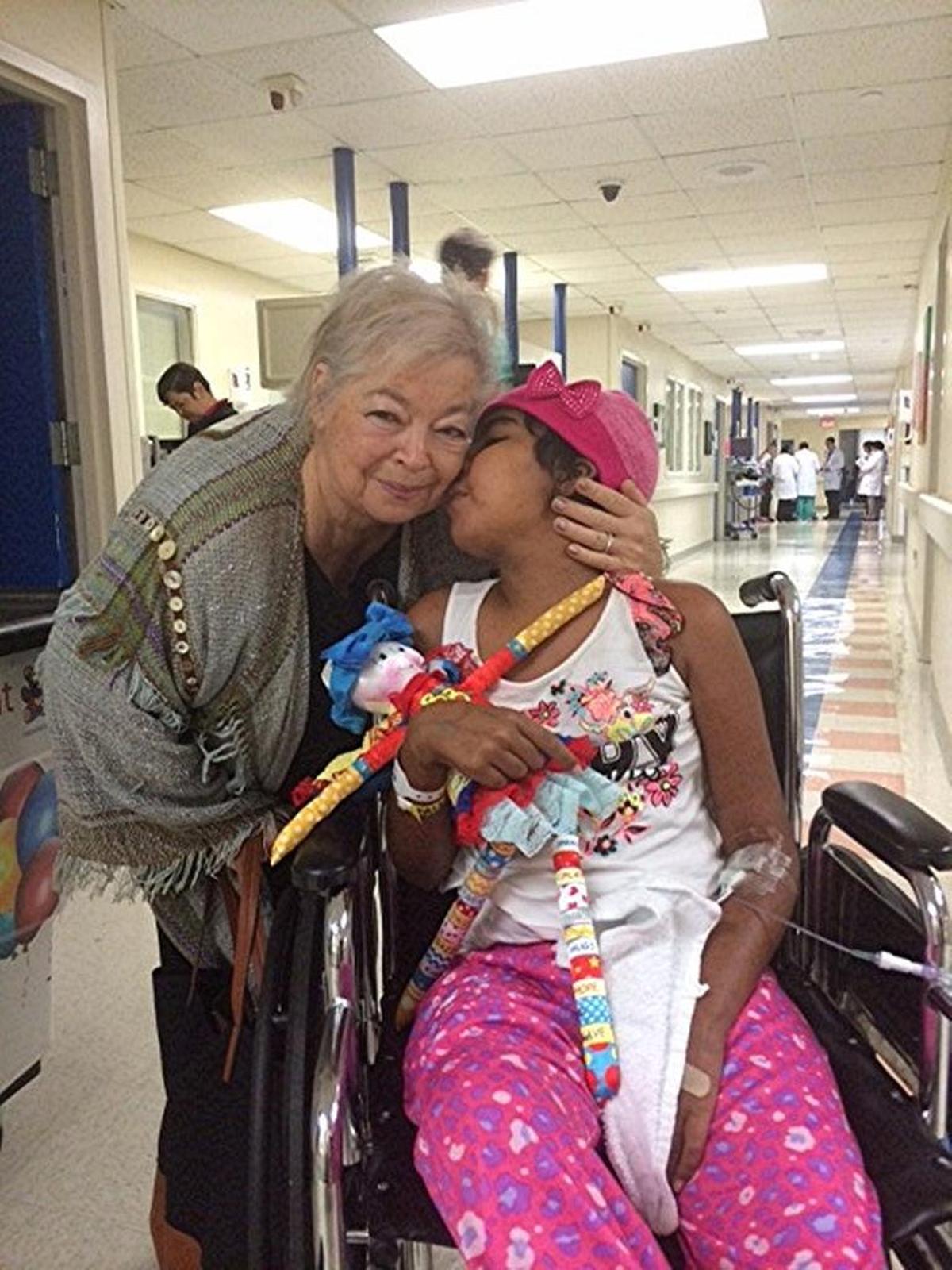 Rosanna Bernstein with Valaria, a young cancer patient.