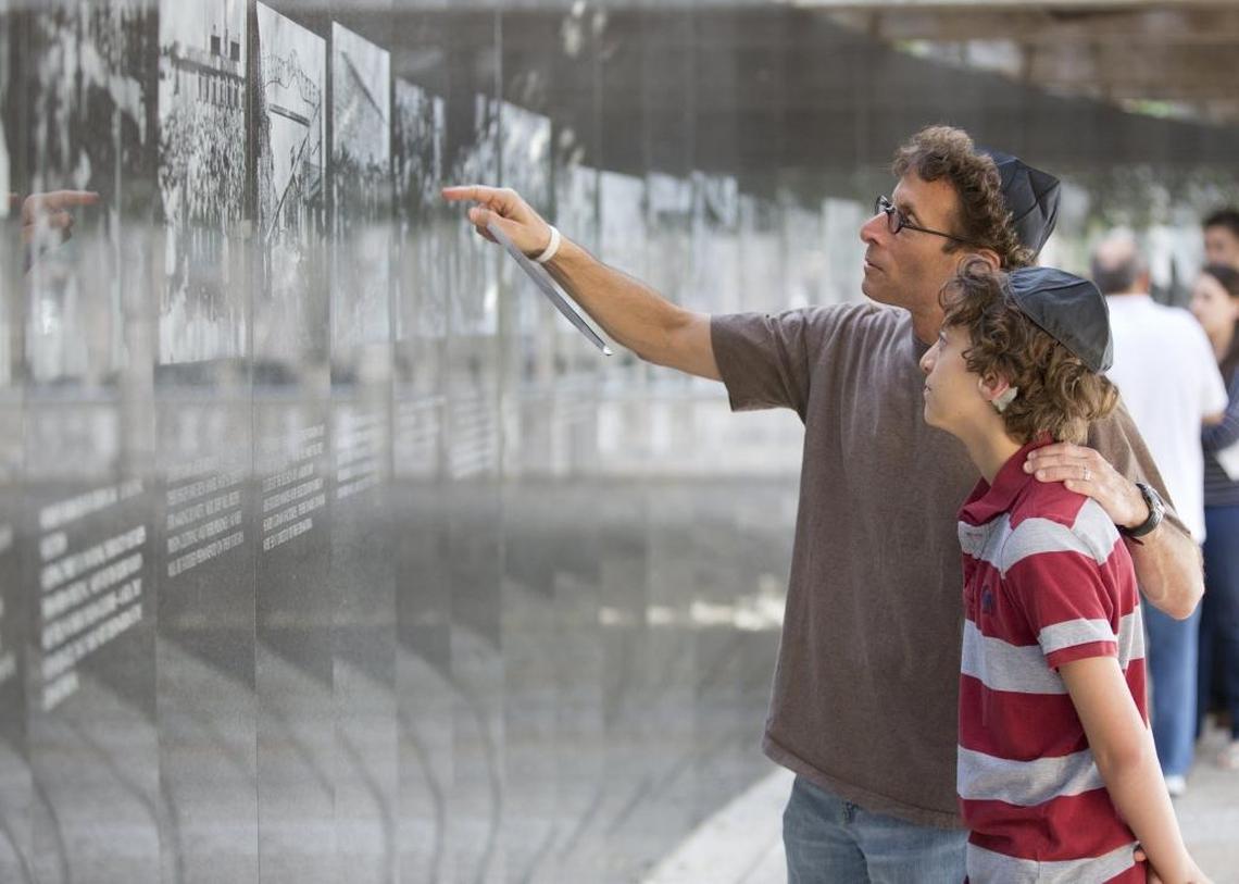 Lyle Stern and son Oliver Stern during a 2013 Yom HaShoah observance at the Holocaust Memorial in Miami Beach.