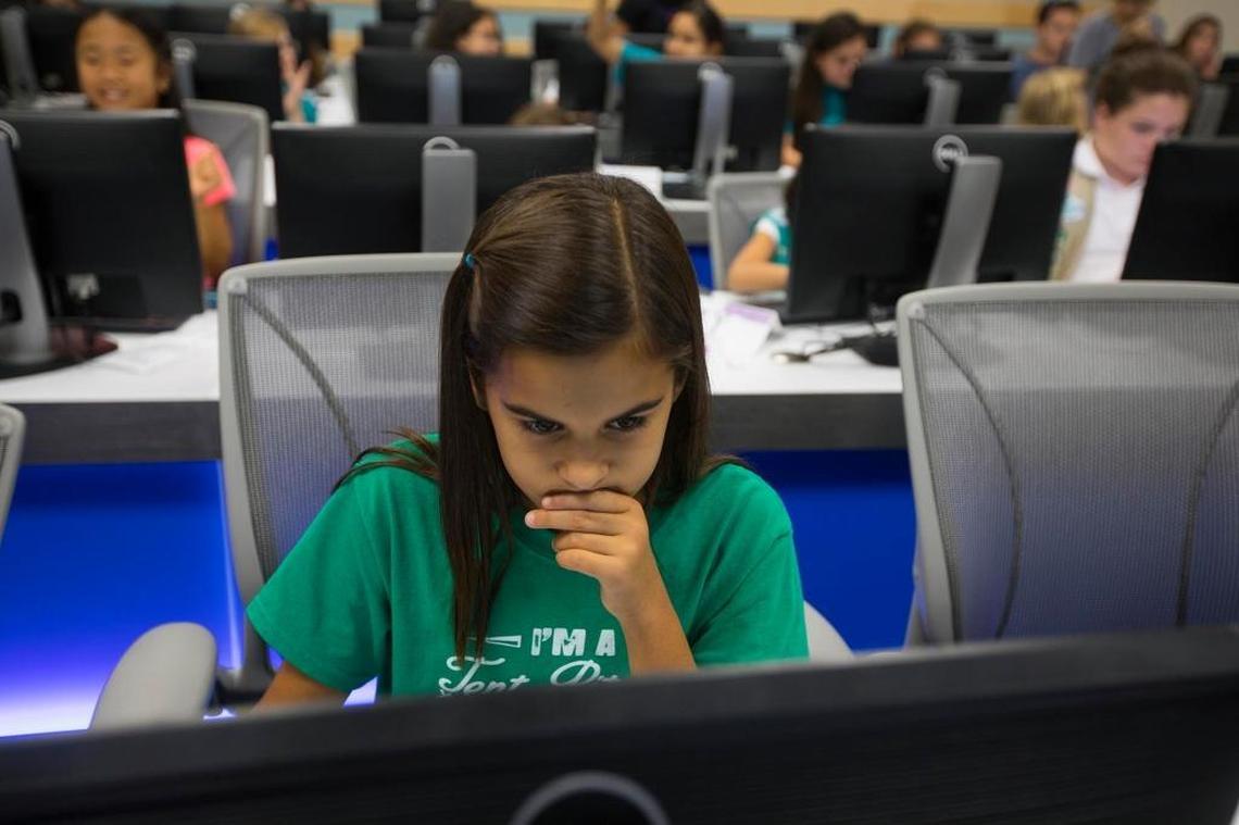 Danica Morissette, 9, creates art through coding during a CodeArt/Girl Scouts Coding workshop at FIU’s main campus on Saturday, Oct. 21, 2017.