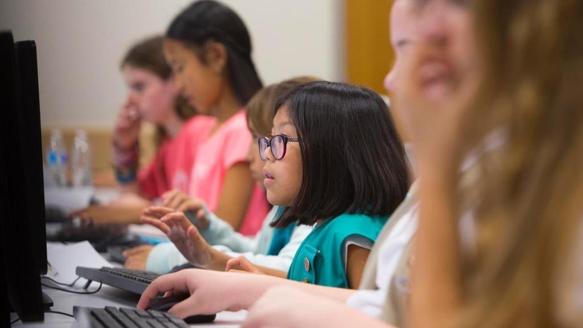 Lucy Oliver, 10, creates art through coding during a CodeArt/Girl Scouts coding workshop at FIU’s main campus on Oct. 21.