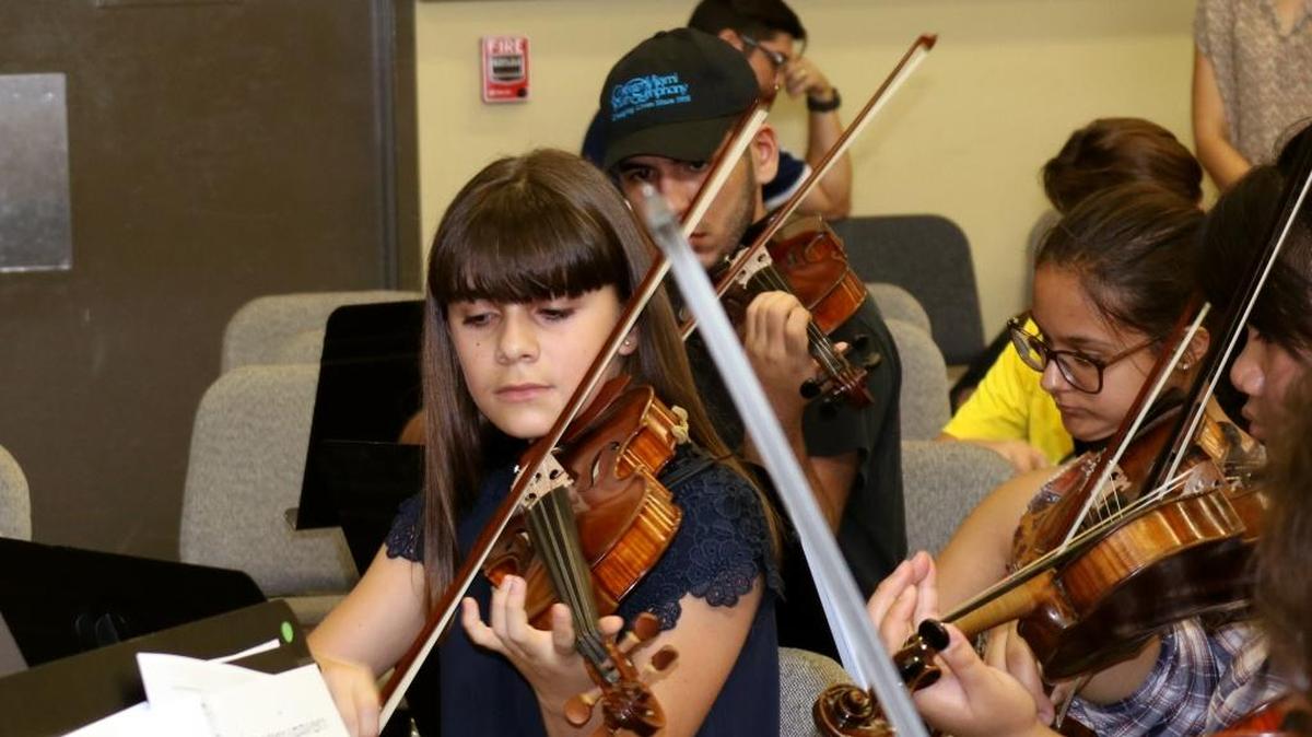 Musicians with the Greater Miami Youth Symphony practice at the University of Miami.
