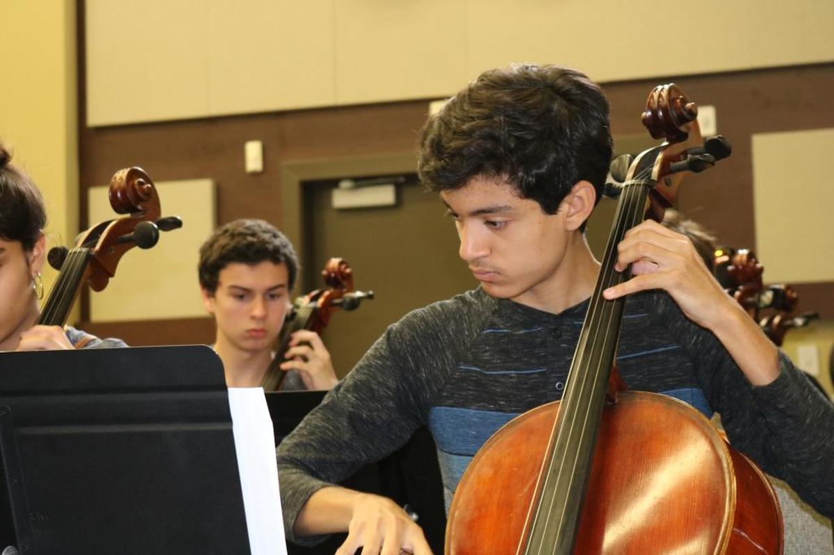 Adrian Ulloa, a 16-year- old principal cellist with the Greater Miami Youth Symphony, said his involvement in the program has improved his leadership skills and made him more responsible.
