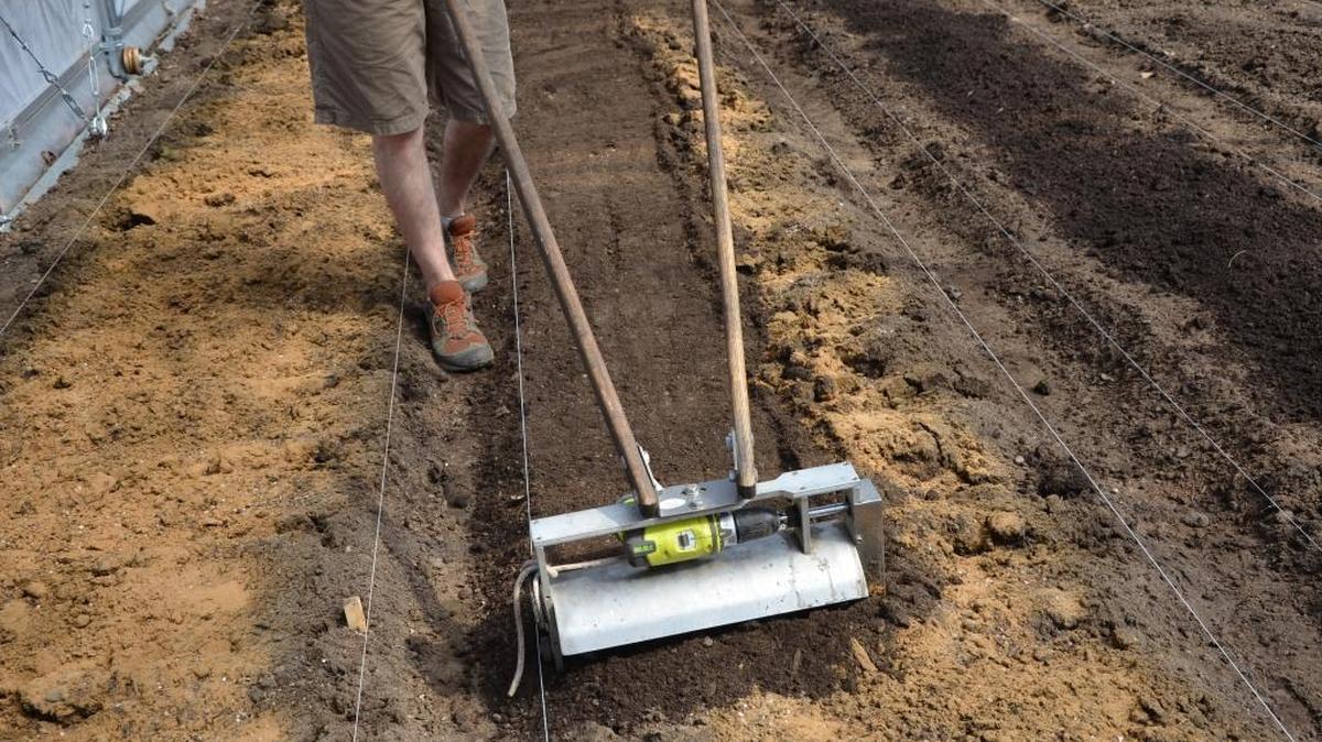 Crab meal is added to the soil in the author's garden with a shallow tiller called a "tilther." Crustracean shells are highly beneficial to soil.