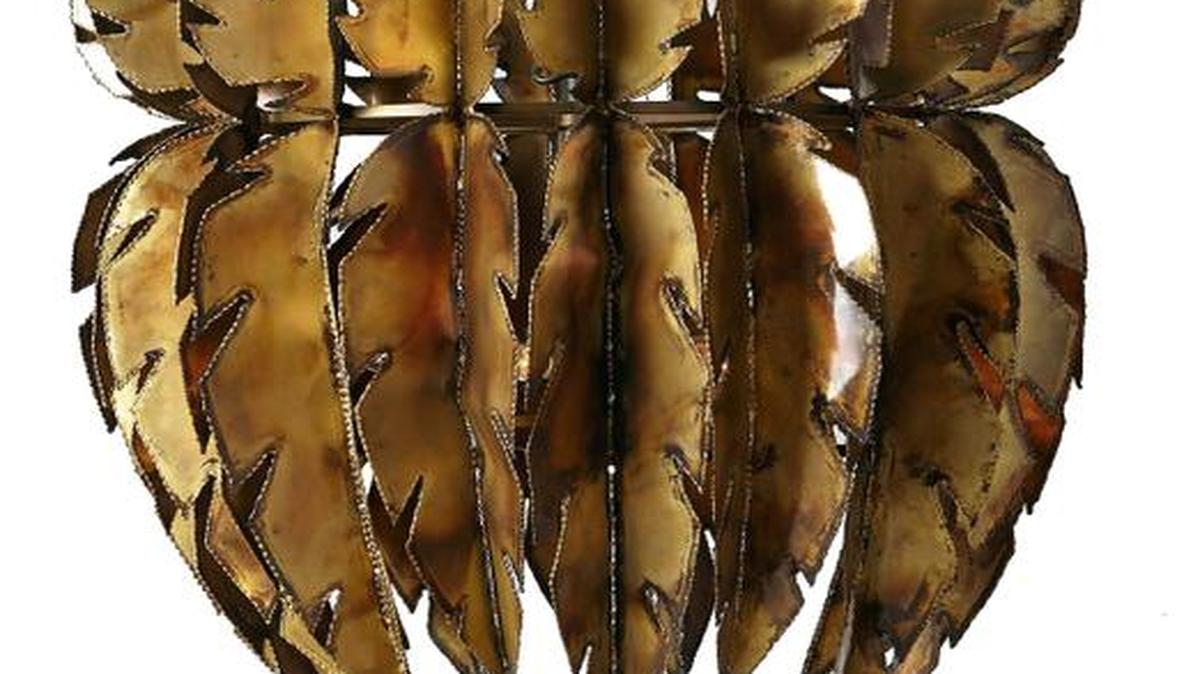 
This chandelier crafted from brass feathers makes a striking statement. 
