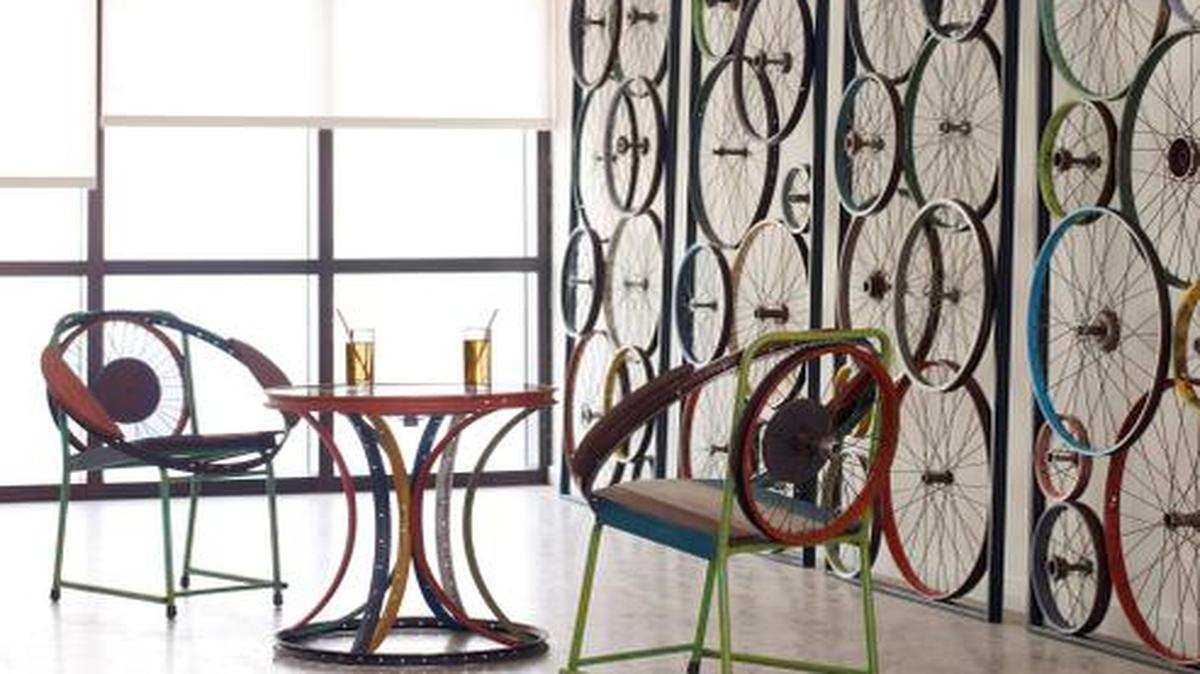 
The Bicycle Screen, made of discarded bicycle parts, has three panels that are hinged together, allowing for many configurations. 
