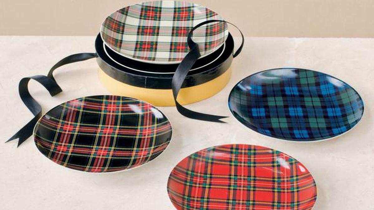 
Tartan plates take the Scottish décor trend to the table. The iconic pattern is showing up on furnishings and accessories for this fall as Scotland joins England as an inspiration for designers.
