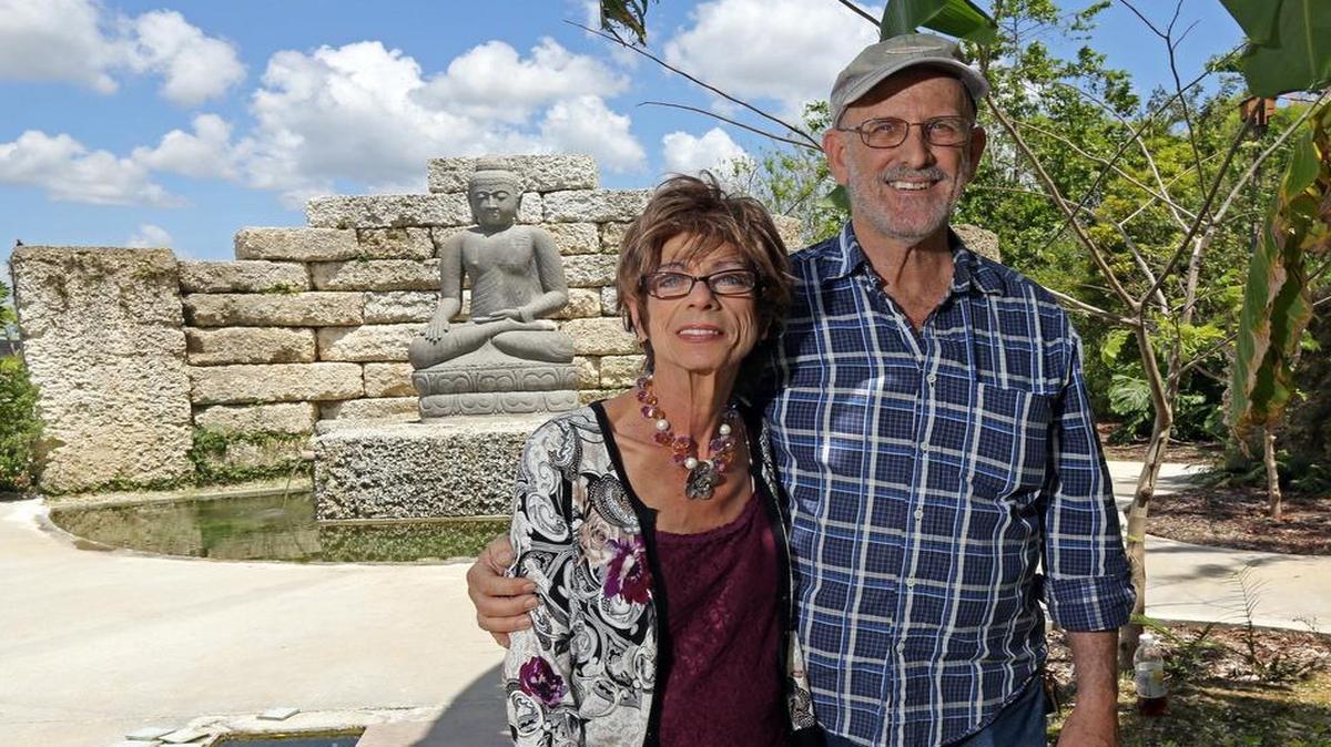 About eight years ago, Joyce and Bruce Chesney fell in love with a piece of Redland property that still had acres of rare tropical hammock. The Chesneys are pictured in front of one of their favorite Buddha statues in one of their many lovely gardens on the property.