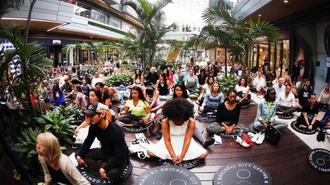 Hundreds gathered earlier this year for a group meditation at Brickell City Centre to celebrate Earth Day. Interest in meditation has increased in light of scientific research that supports claims of its healthy benefits.