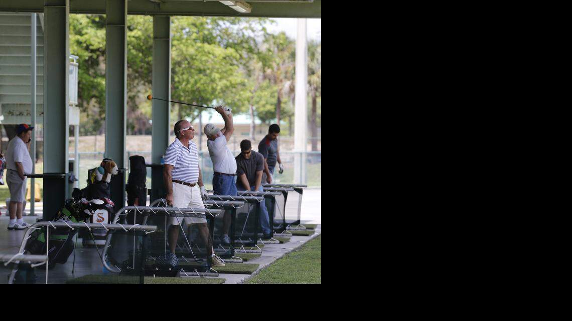 
C.B. Smith Park: Golfers take swings this week from a double-deck driving range, one of the draws of C.B. Smith Park in Pembroke Pines. 
