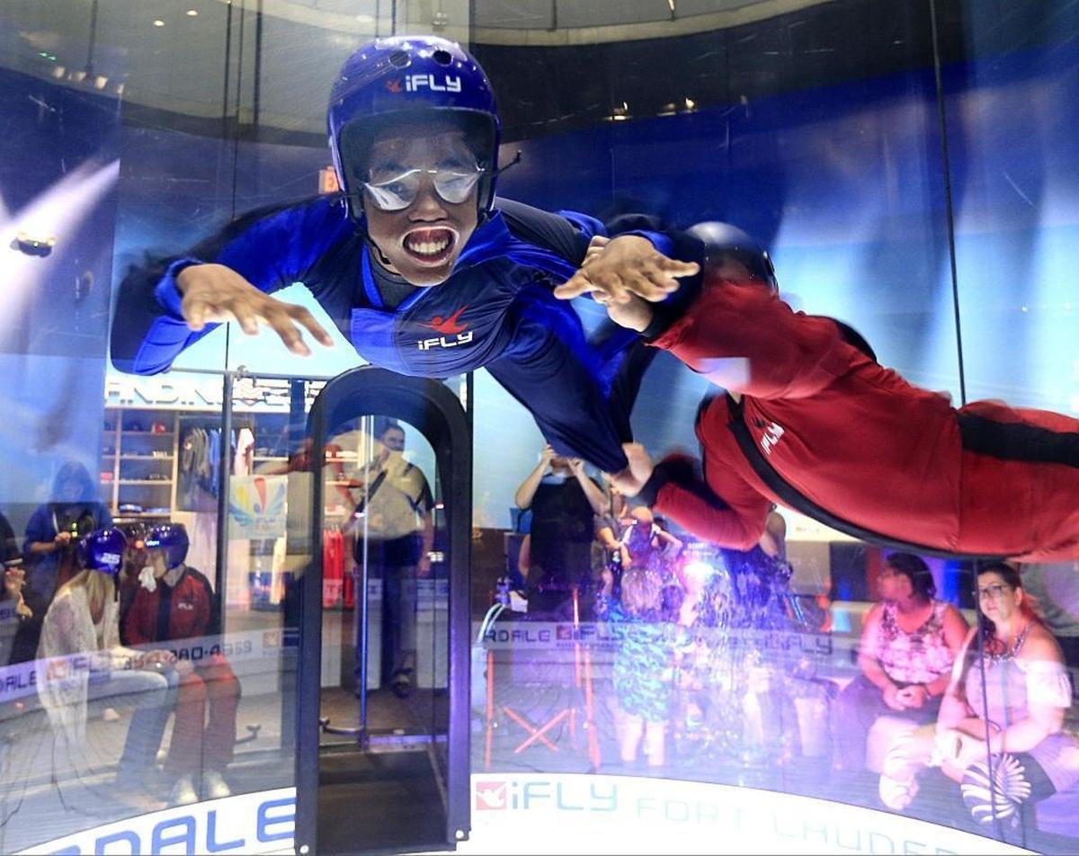 Mikai Williams, 16, is airborne as he floats inside the wind chamber.