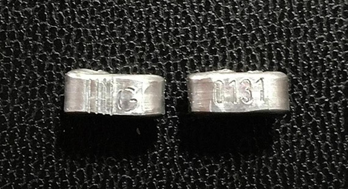 The metal ties on which consumers can find the lot numbers to see if their chub has been recalled.