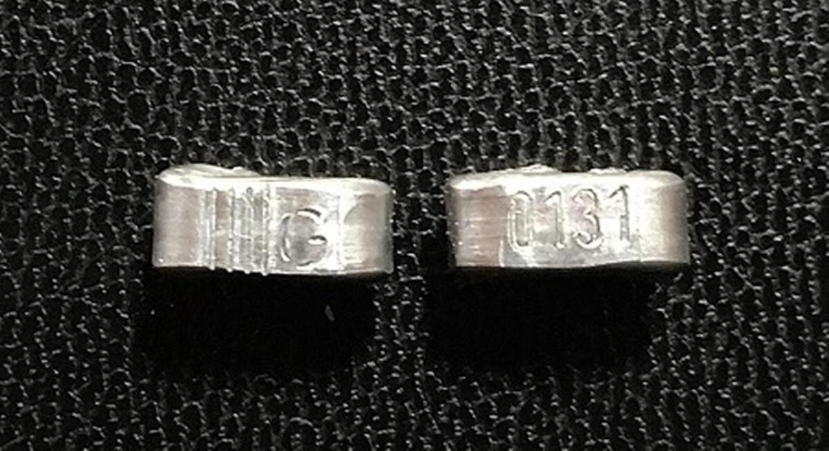 The metal ties on which consumers can find the lot numbers to see if their chub has been recalled.