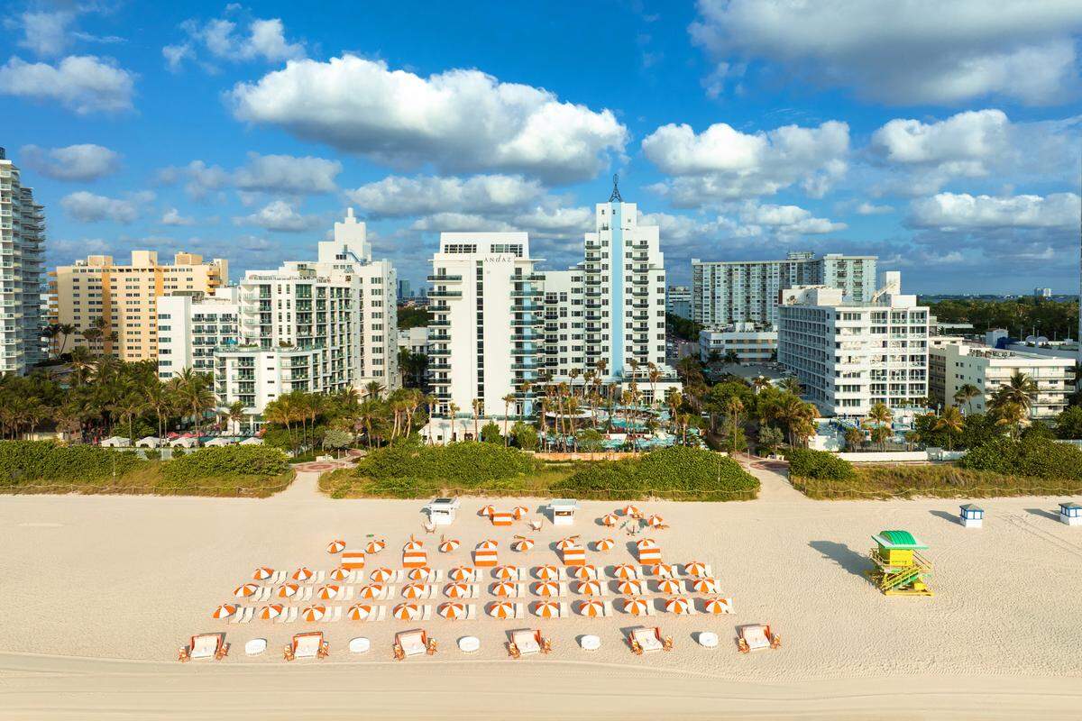 Retro-inspired umbrellas line the private stretch of South Beach at the newly rebranded Andaz.