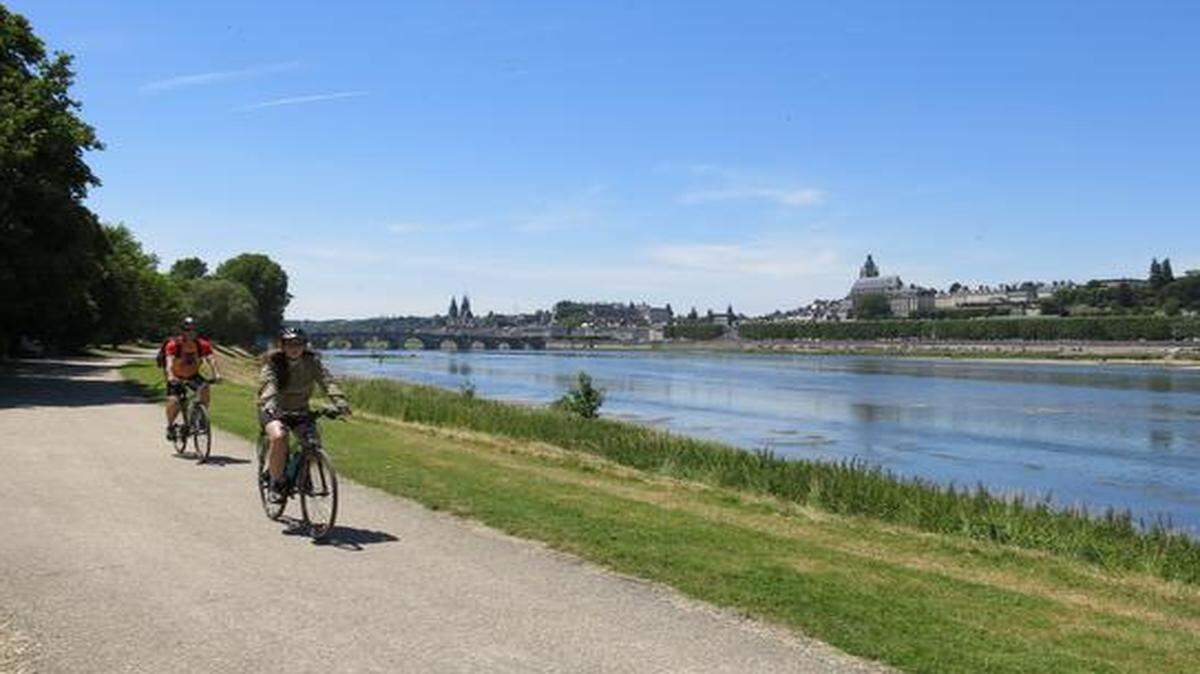 
ON THE WATERFRONT: Cyclists bike along the Loire River near Blois.
