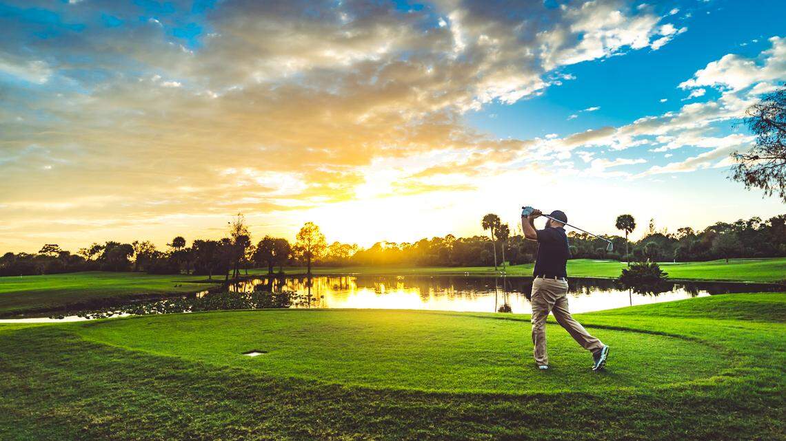 Man golfing on a golf course in south Florida. 