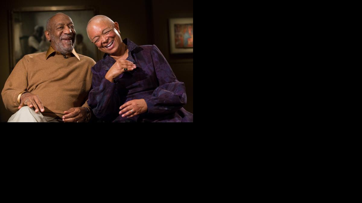 
Bill Cosby and his wife Camille share a laugh as they tell a story about collecting one of the pieces in the exhibit, “Conversations: African and African-American Artworks in Dialogue,” at the Smithsonian's National Museum of African Art in Washington. 
