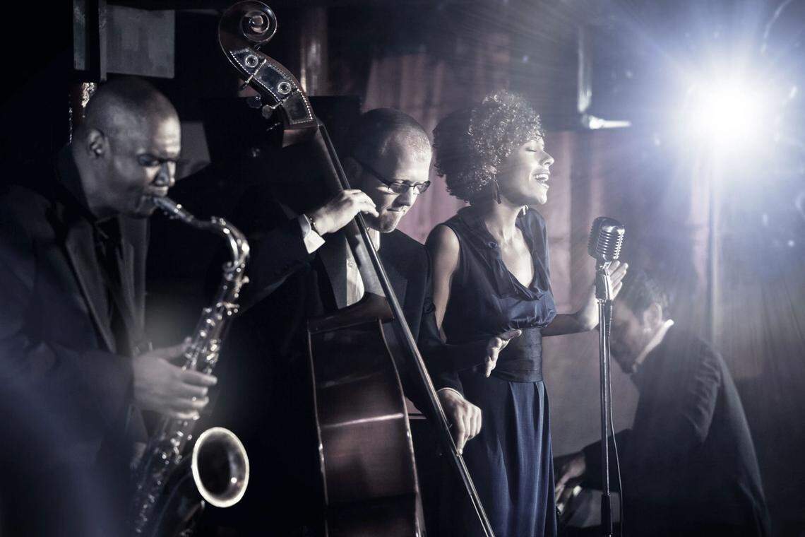 Lively musicians performing on stage at Judson's Live.