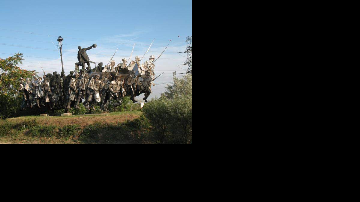 
The Bela Kun Memorial is displayed in Memento Park, along with other Communist era statues. 
