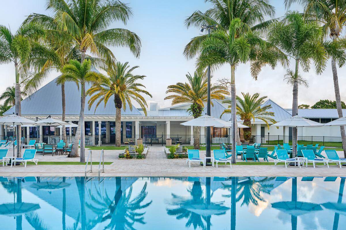 The main pool at Voco Sandpiper All-Inclusive Resort anchors the newly reimagined riverfront property in Port St. Lucie.