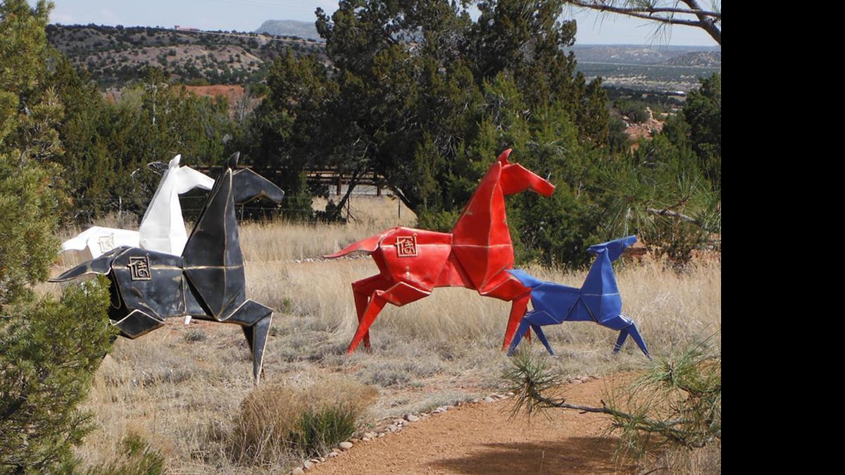 
‘Painted Ponies’ by Kevin Box and Te Jui Fu are metal sculptures inspired by origami and are on display at the Turquoise Trail Sculpture Garden near Santa Fe.

