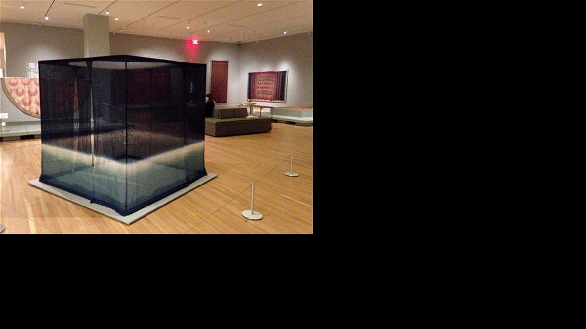 
This photo taken Monday, March 16, 2015 shows shows the installation of part of the new exhibit Unraveling Identity at the new Textile Museum at George Washington University in Washington. 
