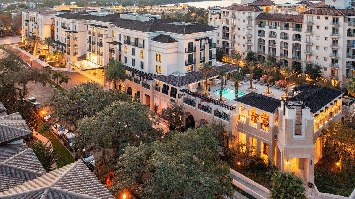 An aerial view of The Alfond Inn highlights its Mediterranean-inspired architecture and central location in Winter Park.