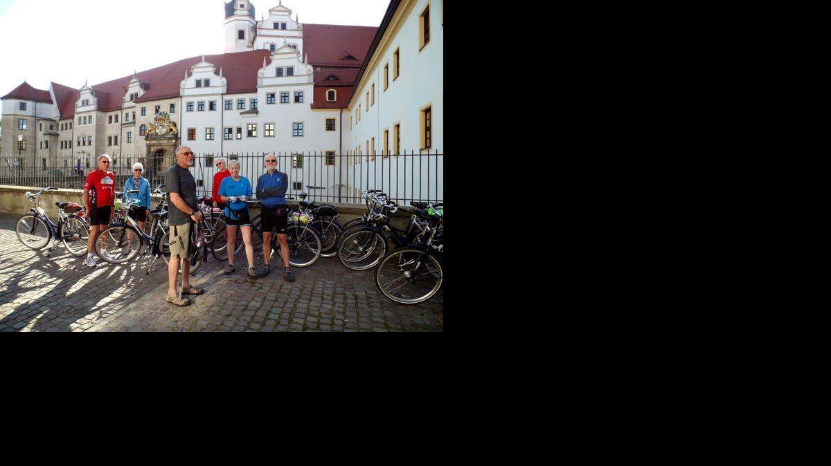 
Bicyclists stand above the bear pit at the early Renaissance Hartenfels Castle in Torgau.
