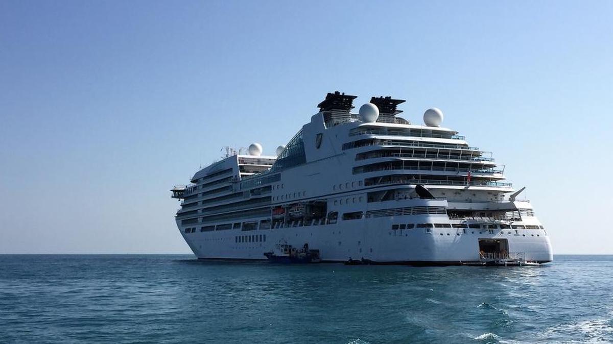 Seabourn Encore anchored in the Persian Gulf off Sir Bani Yas Island, a private beach resort built for cruise ship passengers in Abu Dhabi, United Arab Emirates.