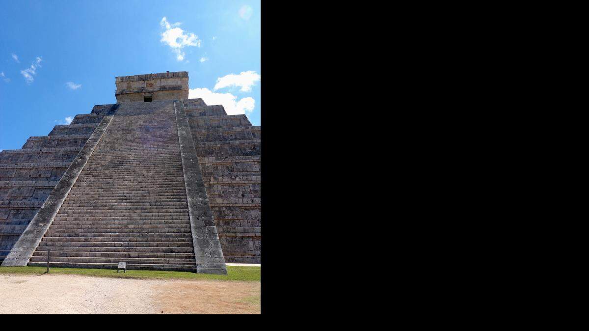 
The Temple of Kukulkan, also known as as El Castillo, is the central feature of Chichen Itza. The four-sided pyramid is actually a Mayan calendar.
