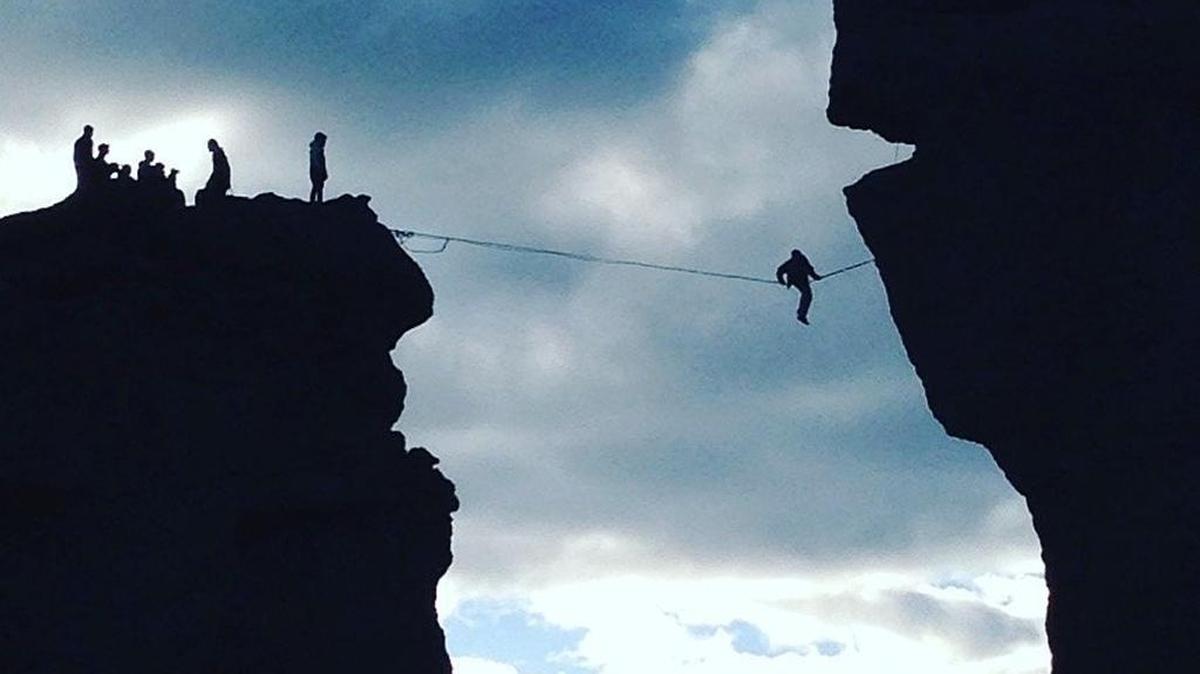 A pair of rock climbing guides set up a massive swing off on the Monkey Face at Smith Rock State Park feature and invited people with enough nerve to take a massive leap of faith.