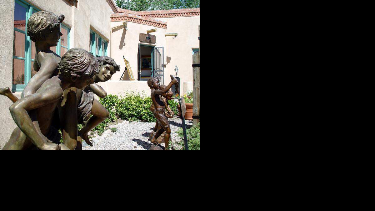 
Art on display in Santa Fe's Canyon Road neighborhood. Canyon Road is home to more than 100 fine art galleries and studios that welcome visitors for free. 
