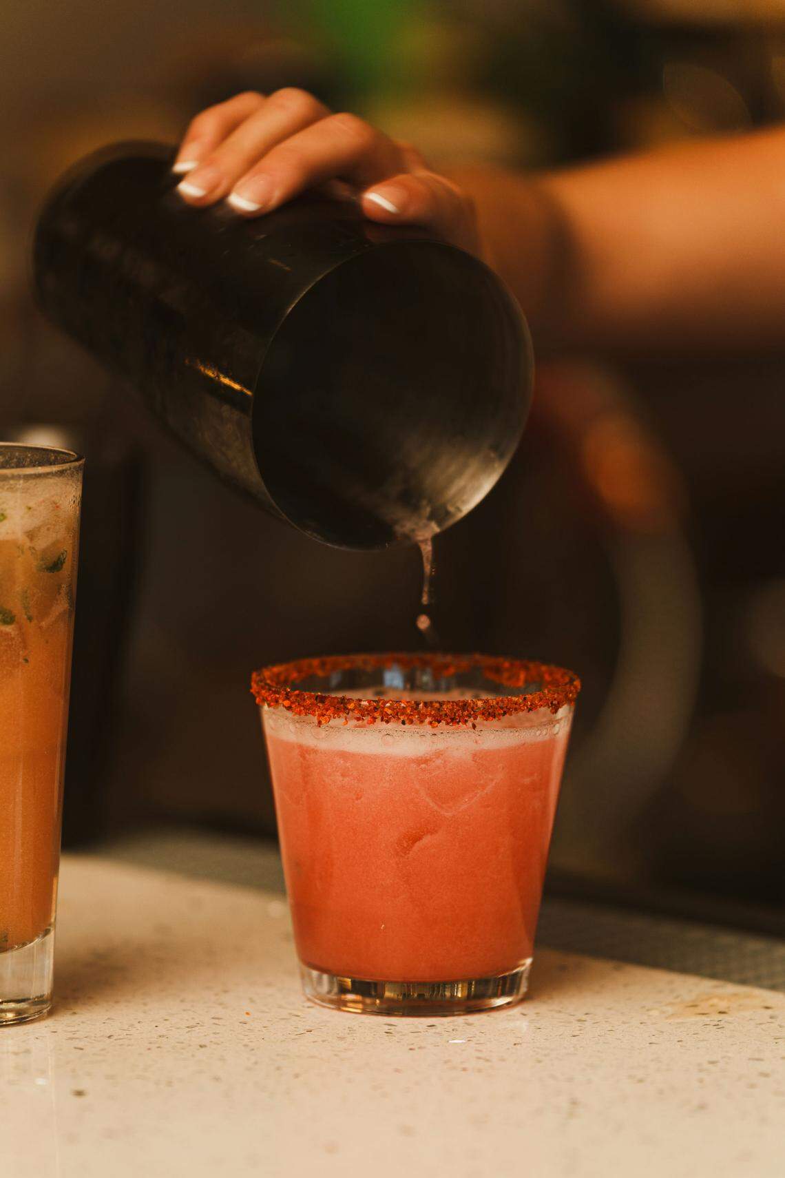 Handcrafted cocktails come with a waterfront view at Lamarina.