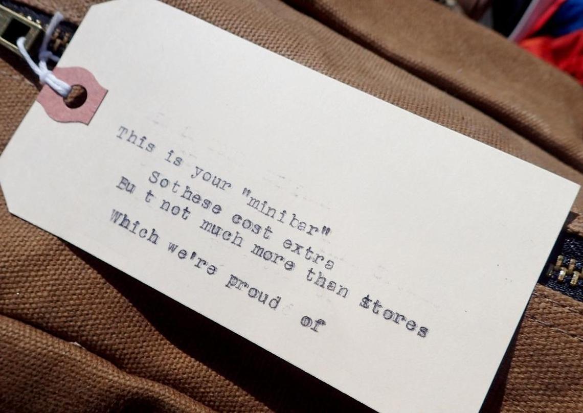 Typed notes attached to waxed canvas bags add a personal touch.