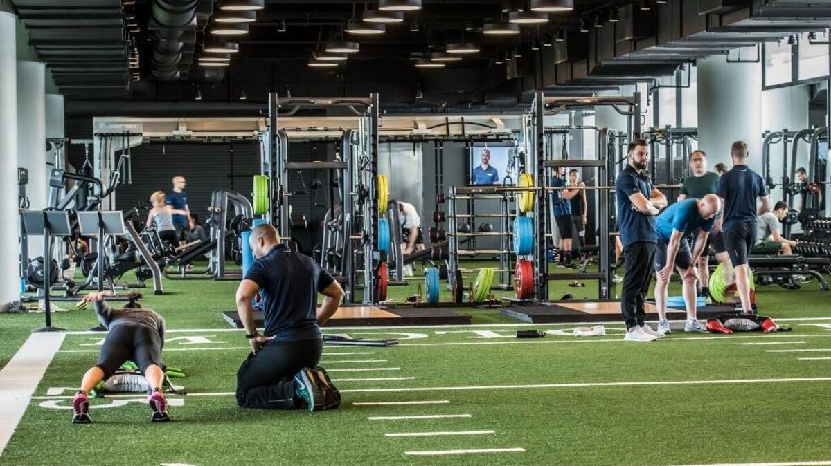 The facilities at Chicago's Midtown Athletic Club include 15 indoor tennis courts, multiple pools, golf simulators, a high-tech cycling studio, and a boxing ring.