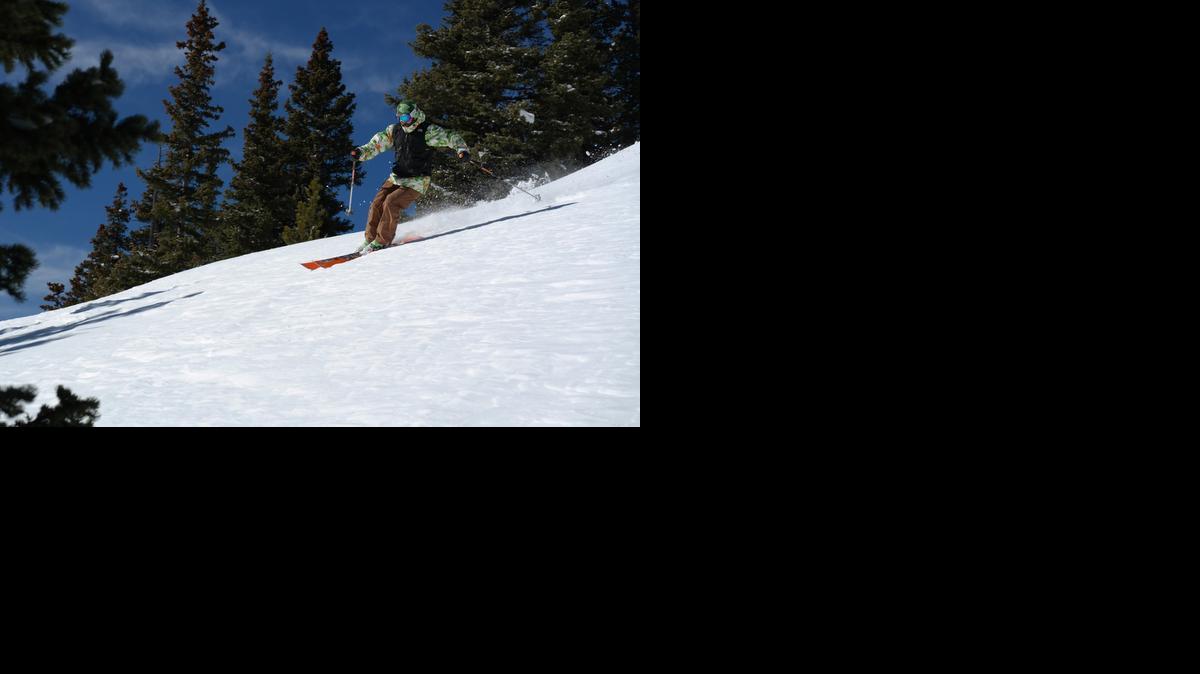 
A skier takes a run on a snowy mountain at Ski Monarch in Colorado.


