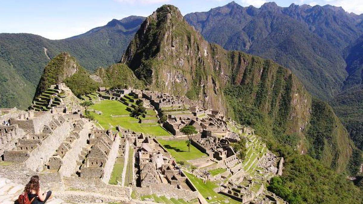
The wonders of the ruins of Machu Picchu, high in the mountains of Peru, open up to hikers at the end of a three-day climb.
