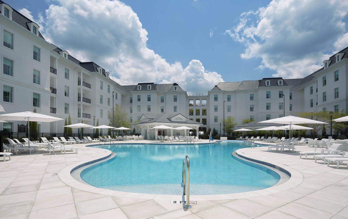 Family-friendly pools at The Riding Academy Hotel offer a relaxed place to cool off between exploring the expansive grounds.