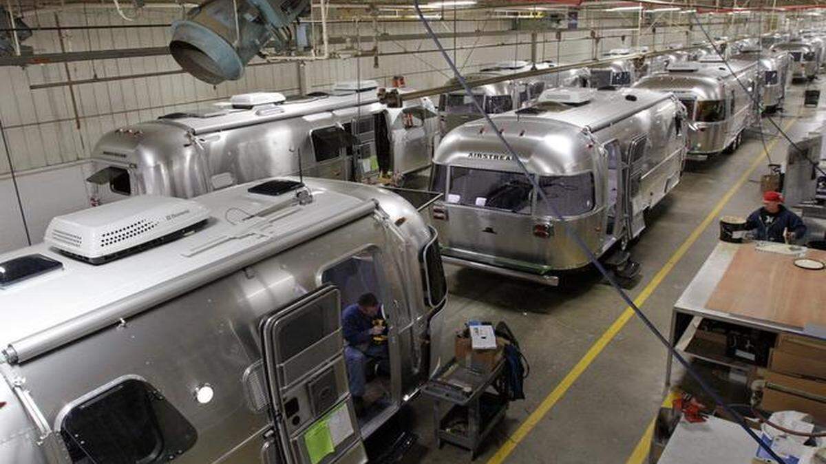 
Airstream travel trailers line the factory floor as they are at the factory in Jackson Center, Ohio. 
